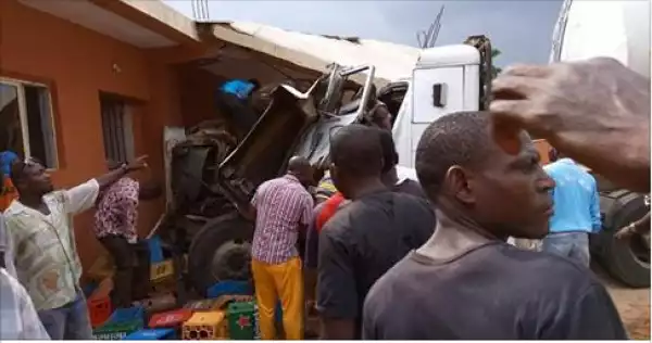 [See Photos] Reckless Tanker Driver Rams Into A Company Building In Anambra State